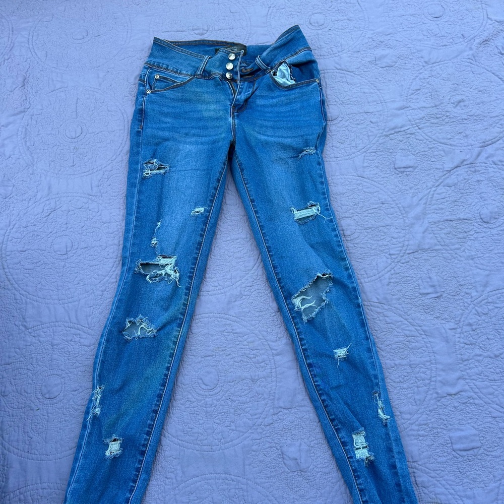 Blue Skinny Jeans with Distressed Details